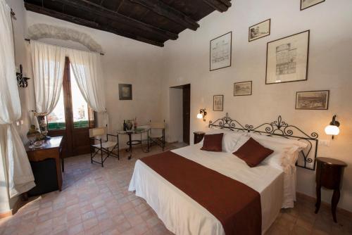 Postel nebo postele na pokoji v ubytování Camere da Cecè