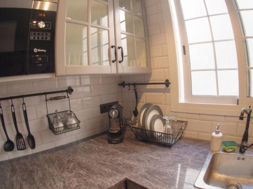 Kuchyň nebo kuchyňský kout v ubytování Valencian Apartment