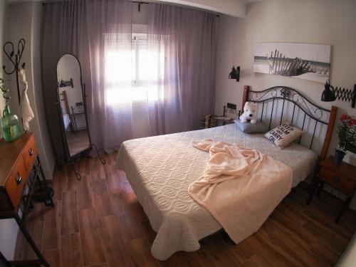 Postel nebo postele na pokoji v ubytování Valencian Apartment
