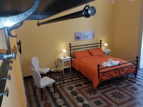 Postel nebo postele na pokoji v ubytování Central Suites Catania
