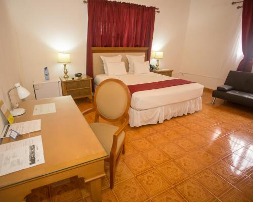 Un ou plusieurs lits dans un hébergement de l'établissement Auberge Villa Cana