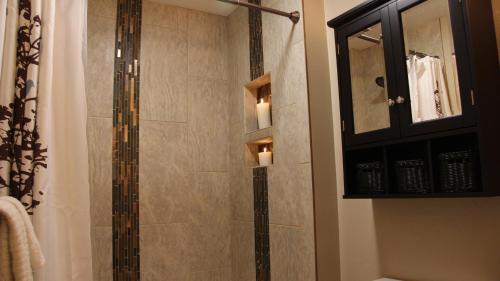 a bathroom with a shower with a glass shower at Cowboy Condo in Whitefish