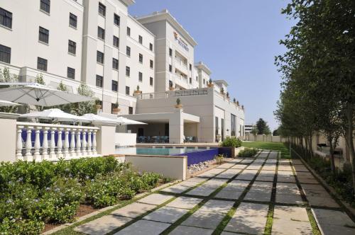 a rendering of the exterior of a hotel at Metcourt at Emperors Palace in Kempton Park