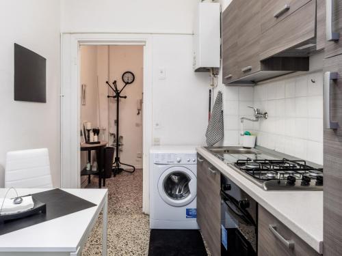Kuchyňa alebo kuchynka v ubytovaní Enjoy Apartment Gorla