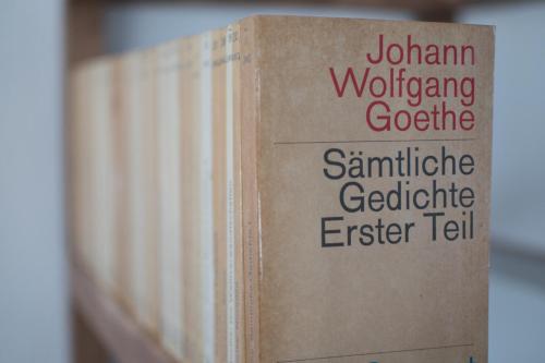 a book sitting on top of a shelf at Weimar Central Artist Loft - 120 m2 in Weimar