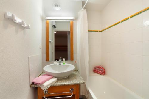 Koupelna v ubytování Résidence Néméa Les Balcons d'Ax