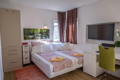 Posteľ alebo postele v izbe v ubytovaní Villa Vesna in Zadar