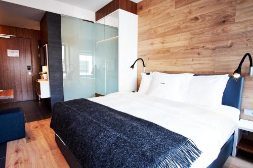 Cama o camas de una habitación en ION City Hotel, Reykjavik, a Member of Design Hotels
