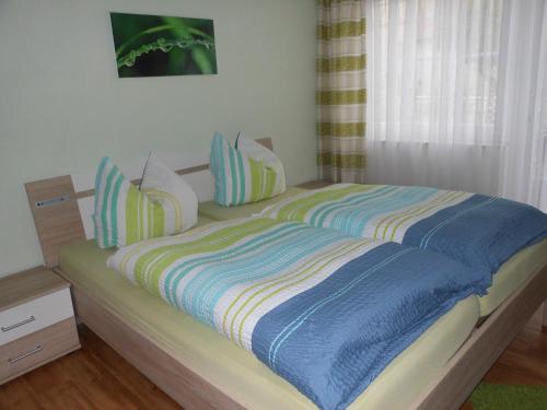 Ένα ή περισσότερα κρεβάτια σε δωμάτιο στο Ferienhaus Weins