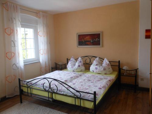 Ένα ή περισσότερα κρεβάτια σε δωμάτιο στο Ferienhaus Weins