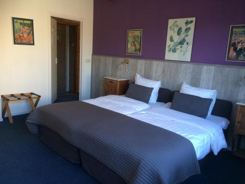 Кровать или кровати в номере Hotel Vierhouten