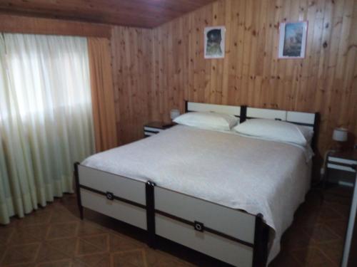 Postel nebo postele na pokoji v ubytování Albergo Al Pino
