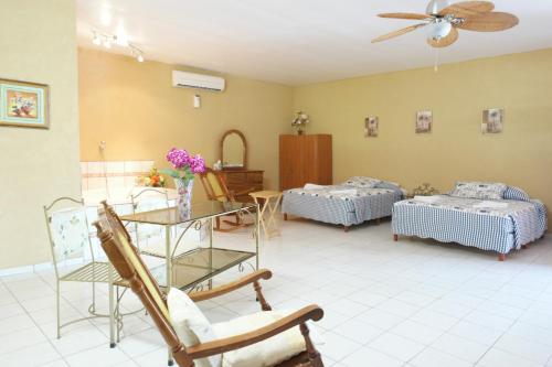Postel nebo postele na pokoji v ubytování Hotel La Arena