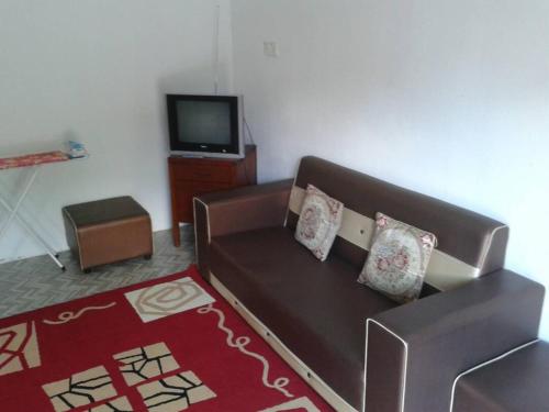 NUE Guesthouse tesisinde bir oturma alanı