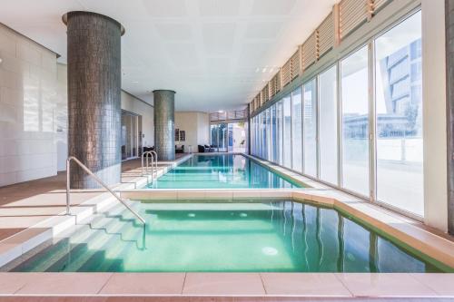 Swimming pool sa o malapit sa Holiday Holiday H-Residences Apartments