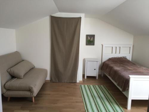 Postel nebo postele na pokoji v ubytování Pargi Apartment