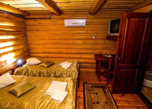 Postel nebo postele na pokoji v ubytování Hotel and restaurant complex Skolmo