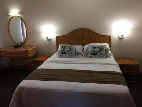 Una cama o camas en una habitación de Magoebaskloof Mountain Lodge
