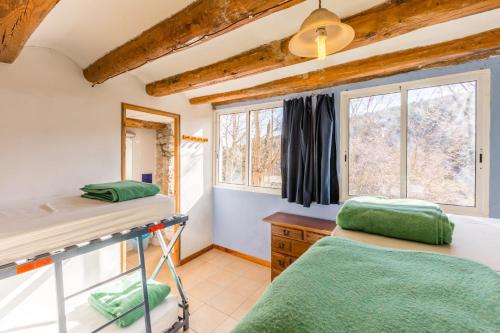 Postel nebo postele na pokoji v ubytování Alberg La Solana