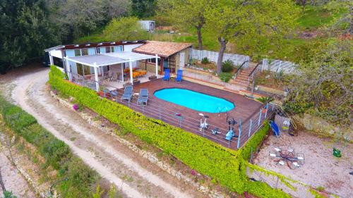 an overhead view of a house with a swimming pool at B&B Casa Casotto in Amantea