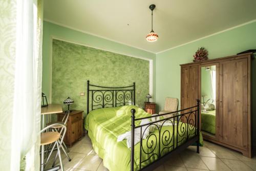 Кровать или кровати в номере Locanda Belvedere Da Stefano