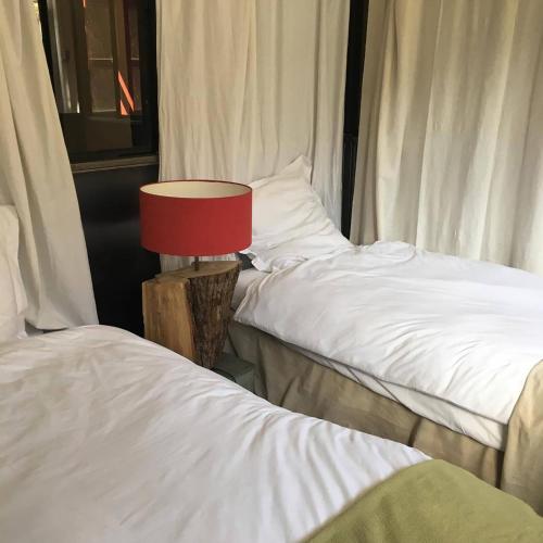 Cama o camas de una habitación en Un Autre Monde