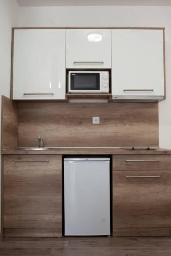 B&T Apartmentsにあるキッチンまたは簡易キッチン