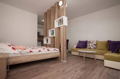B&T Apartmentsにあるベッド