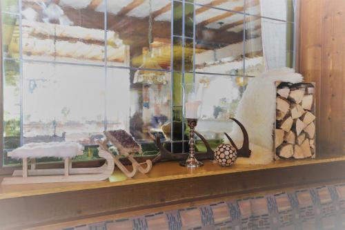 a window sill with various items on it at Landgasthof Schuster in Nesselwängle