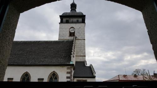 a clock tower on top of a building at Apartment Jakubske Namesti in Česká Kamenice