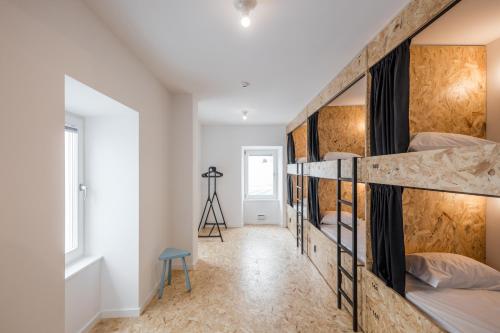 Hostel Conii & Suites Algarveにあるベッド