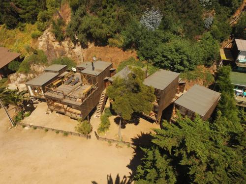 an aerial view of a house on a beach at La Ritoqueña Hotel de Playa in Concón