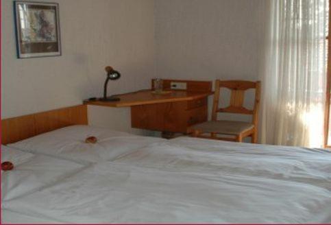 Katil atau katil-katil dalam bilik di Hotel Glück