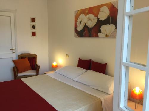 Ένα ή περισσότερα κρεβάτια σε δωμάτιο στο Casa sul Mare - WIFI free - parcheggio privato