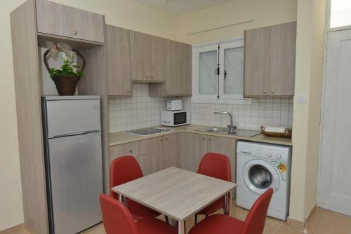 ครัวหรือมุมครัวของ Poseidono's Apartment