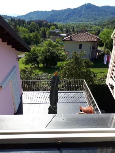 a statue of a nun on the roof of a house at Casa Rea in Beverino