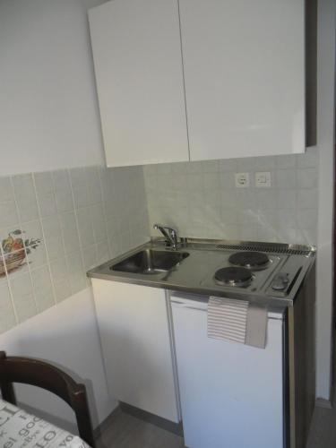 Dapur atau dapur kecil di Rooms Mario