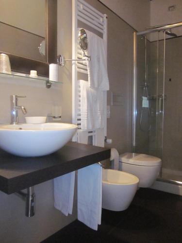 Ein Badezimmer in der Unterkunft Albergo Del Sole