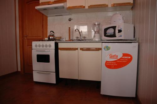 Una cocina o zona de cocina en Cabañas de Nené Aparts