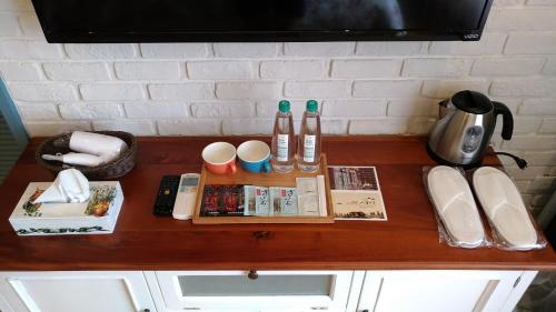 a wooden table with items on top of it at Charmole in Wujie