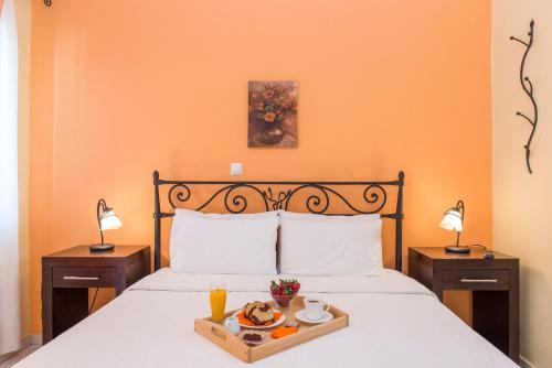 Ένα ή περισσότερα κρεβάτια σε δωμάτιο στο Kostis Villas