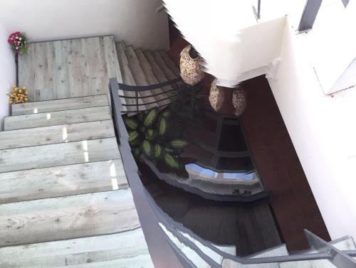an overhead view of a staircase in a house at Kenting Lian Nan Wan in Nanwan