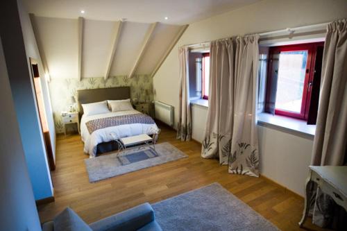 Ένα ή περισσότερα κρεβάτια σε δωμάτιο στο Casa das Veigas