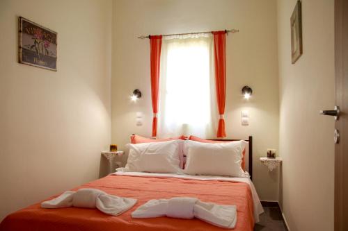Voodi või voodid majutusasutuse Aggelis Villa toas