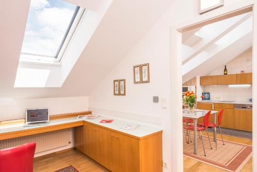 Kuchyň nebo kuchyňský kout v ubytování Appartements Ferchergasse