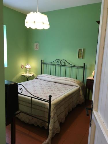 Ένα ή περισσότερα κρεβάτια σε δωμάτιο στο Agriturismo Renaccio