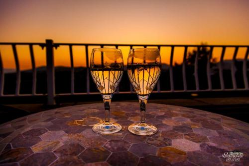 two wine glasses sitting on top of a table at Samona in Kilkeel