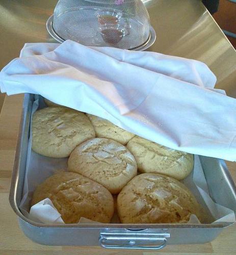 a container of muffins sitting on a table at Helicon Muses Friendly Mountain B&B Guesthouse in Evangelístria