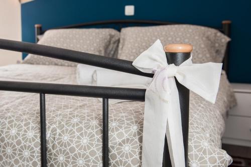a black crib with a white bow on it at Apartment Simone in Split
