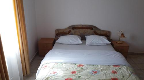 Un ou plusieurs lits dans un hébergement de l'établissement Apartments Šofranac